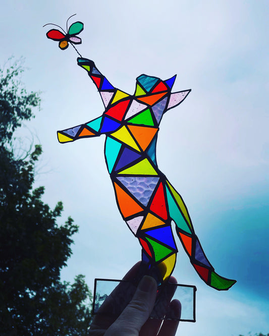 Stained glass cat chasing a butterfly with light, unique colourful rainbow gift