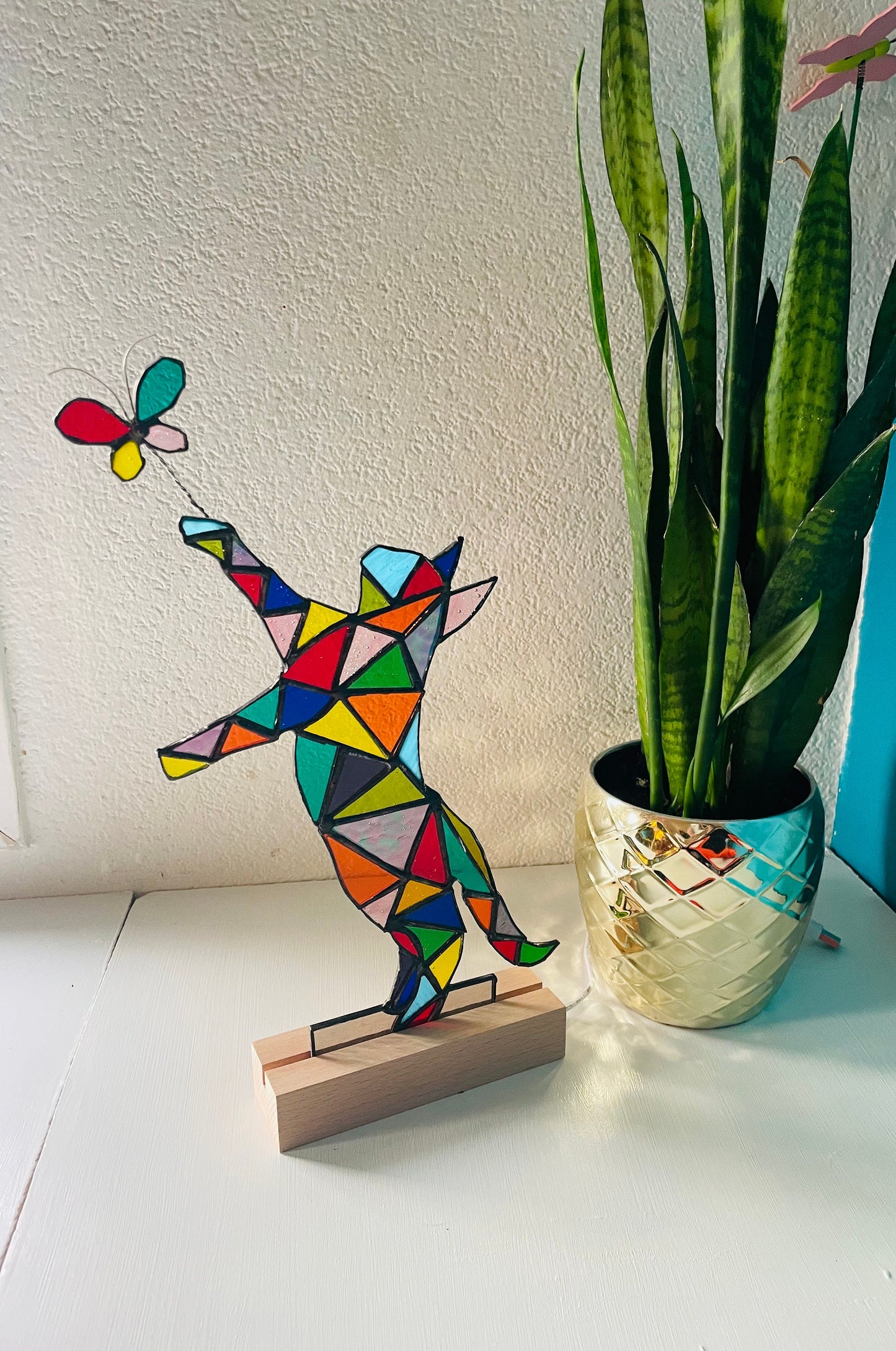 Stained glass cat chasing a butterfly with light, unique colourful rainbow gift